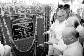 Haryana Chief Minister Bhupinder Singh Hooda lays the foundation stone for Valmiki Bhawan at Mullana (Ambala) on Tuesday