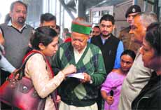 Former Union Minister Virbhadra Singh meets people at the Holly Lodge in Shimla on Tuesday.
