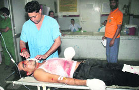 Injured Ranjit Singh being treated at the GMCH in Jammu.