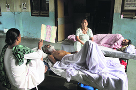 Patients and their attendants at the Civil Hospital in Jalandhar are forced to lie in corridors due to the snapping of power supply following the failure of the Northern Power Grid on Tuesday.