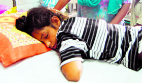 Harpreet Singh, younger brother of the two sisters who died in accident, at the Civil Hospital in Amritsar.