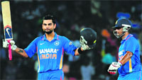 Virat Kohli celebrates after scoring a century during the fourth ODI between Sri Lanka and India in Colombo on Tuesday. India won by 6 wickets, clinching the five-match series 3-1.  AFP