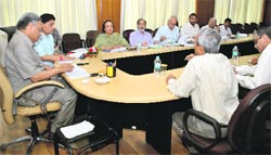 Uttarakhand Chief Minister Vijay Bahuguna chairs a review meeting of sugar mills in Dehradun on Wednesday. 