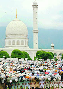 Call of Devout: Devotees offer prayers during Ramadan at Hazratbal shrine in Srinagar.