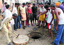 The manhole where safai sewak Pardeep Kumar was swept away by the sewage current in the Haibowal area in Ludhiana on Tuesday