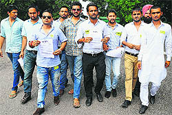 SOPU members come out from the Vice-Chancellors office after submitting a memorandum at Panjab University in Chandigarh on Thursday