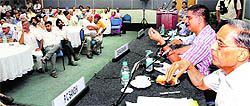 PC Sangi, former councillor, and Chandigarh DSP (Security) Deepak Saharan (second from right) interact with members of the Federation of Sector Welfare Associations at the CII in Sector 31, Chandigarh, on Thursday