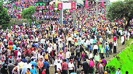 People participate in a stone throwing ritual in Champawat district