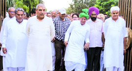 INLD chief OP Chautala comes out with his party MLAs after submitting a memorandum to the Governor in Chandigarh on Thursday.