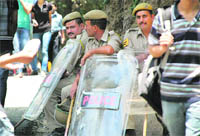 Policemen on the Himachal Pradesh University campus in Shimla. 