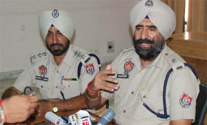 Three persons (above) who were caught with 10.5 quintals of poppy husk. DSP Gurmeet Singh and SP Amarjeet Singh during a press conference (right).