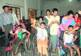 Special children participate in fun games at a sports meet held at Cheshire Home in Dehradun on Friday.