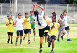 A match under way on the opening day of the Inter-Zone District Football Championship (girls U-17) at Kitchlu Nagar on Friday.