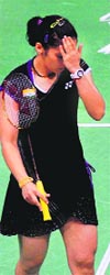 Saina Nehwal reacts after losing her semifinal match against Chinas Wang Yihan in London on Friday.  PTI