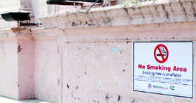 No-smoking board pasted outside the Town Hall in Amritsar.