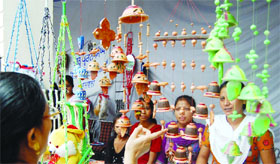 Residents take a look at handicrafts made by inmates.