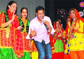 Punjabi actor and singer Harbhajan Mann performs with students at MCMDAV College, Sector 36, in Chandigarh on Saturday