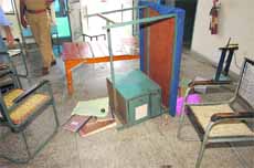 A table upturned at Shahidanwali substation after some villagers ransacked it on Saturday.