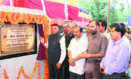 Chief Minister PK Dhumal inaugurates a complex of the HP State Wool Federation at Banuri in Palampur on Saturday.