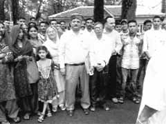 AICC observer Shamsher Singh Gogi with supporters in Palampur.