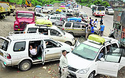 Vehicles stranded at Nagrota on the Jammu-Srinagar national highway following landslides