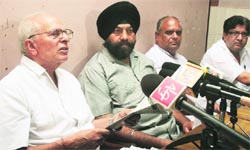 Members of the Brick Kiln Owners Association address the mediapersons in Jammu. Tribune photo: Inderjeet Singh