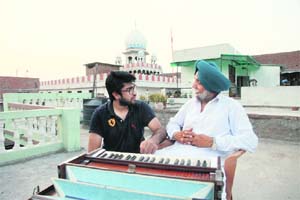 Gunjit Chopra (left), a young director making a biopic on the Punjabi singer Chamkila, with lyricist Dardi