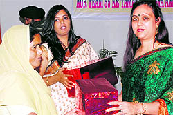 A war widow being honoured at veer nari meet organised at military station in Beas on Sunday
