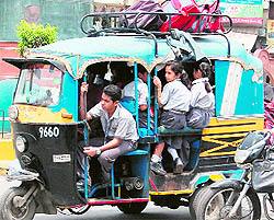 An overloaded auto-rickshaw in Amritsar