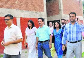 PUTA candidates go door to door to seek votes at Panjab University in Chandigarh on Sunday.