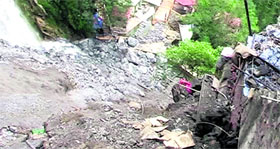 Shops and a lake near Kempty Falls damaged due to a landslide following incessant rains on Saturday night.