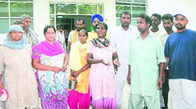 Patients relatives outside the maternity ward crib over the sorry state of services at the Jalandhar Civil Hospital.