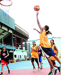 A match in progress during the Mahindra NBA Challenge Basketball League in Ludhiana on Sunday