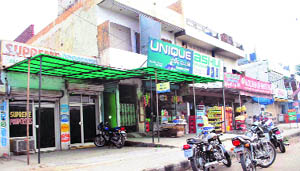 Commercial establishments in a residential area near Ragho Majra in Patiala. 