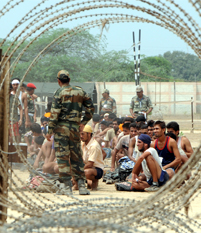 Candidates await their turn at a recruitment drive at Khasa in Amritsar on Monday.
