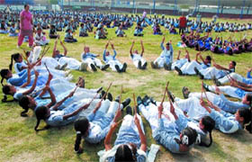Girl students  rehearse for their event scheduled to be held during the Independence Day function, at the Sports Stadium in Bathinda on Monday