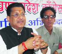 Suryakant Dhasmana, vice-president of the Uttarakhand Congress, addresses a press conference in Dehradun on Monday