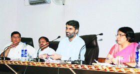 Deputy Commissioner Mandeep Singh Brar addresses a meeting of district officials at Panchayat Bhawan, Kurukshetra.