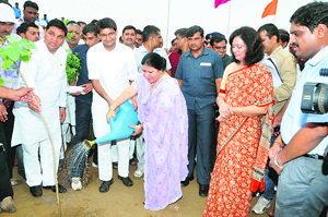 MP Deepender Singh Hooda, along with Education, Social Welfare and Empowerment Minister Geeta Bhukkal, waters a plant in Jhajjar.