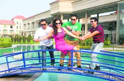 Actor Monica Bedi along with Preet Harpal, Roshan Prince and Karamjit Anmol at a promotional campaign for her first forthcoming Punjabi film Sirphire at a resort near Jalandhar on Monday.