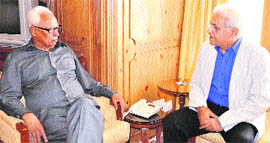 Governor NN Vohra with president of the All India Kashmiri Samaj Moti Kaul during a meeting at Raj Bhawan in Srinagar on Monday. 