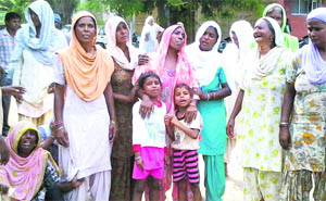 Grieving relatives of Sonu who was beaten to death at Kamalpura village near Jagraon on Monday.