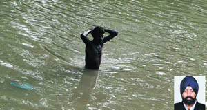 A diver looks for Rajanpartap in Sidhwan Canal, Ludhiana, on Monday. (InsetFile photo of Rajanpartap)