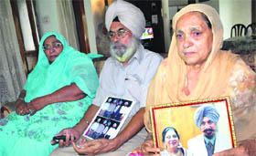 Family members of Satwant Singh Kaleka who was killed in the Wisconsin gurdwara firing, in Patiala on Monday.
