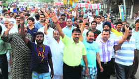 Residents of Gurdaspur hold a protest.