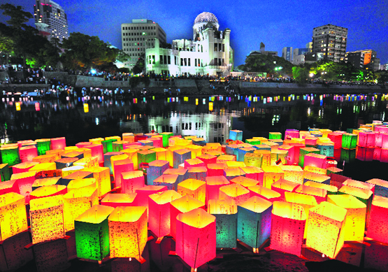 Paper lanterns float on the Motoyasu River in front of the Atomic Bomb Dome in Hiroshima on Monday. Thousands marked the 67th anniversary of the atomic bombing of Hiroshima, as a rising tide of anti-nuclear sentiment swells in post-Fukushima Japan.