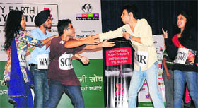 Students perform in a skit on the theme “Save the Nature” at the Government Polytechnic College for Women, Sector 10, in Chandigarh on Tuesday.