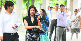 Grief-stricken sisters (in black and white suits) at Fiza's cremation in Chandigarh on Tuesday.