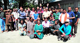 The eighth batch of Kailash Mansarovar pilgrims pose after the end of their yatra on Monday.
