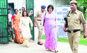 Sumita Mishra (2nd from right), Director General, Women & Child Development, comes out after inspecting Nari Niketan in Karnal on Tuesday.